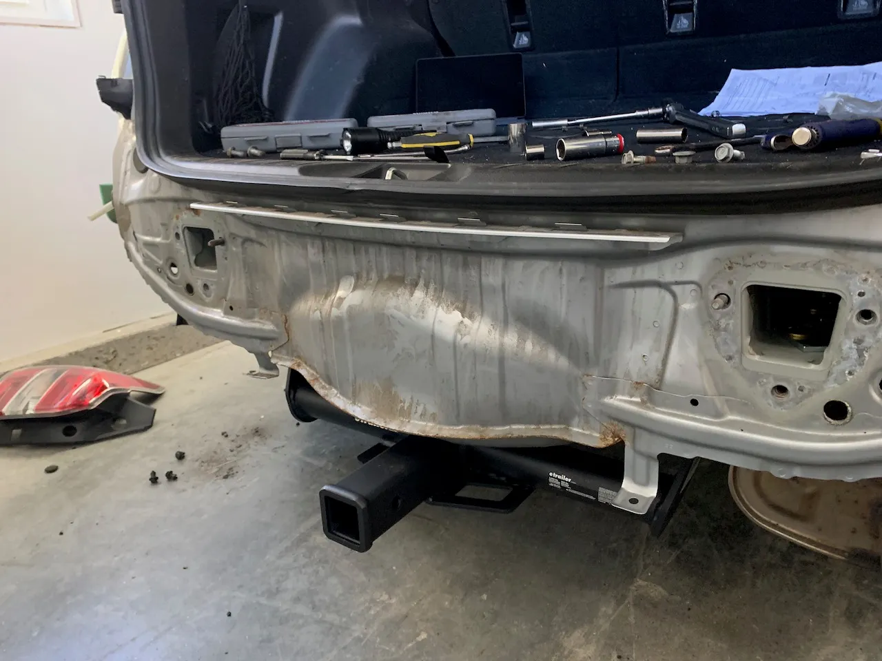 2014 Subaru Forester with the bumper removed for a hitch install.